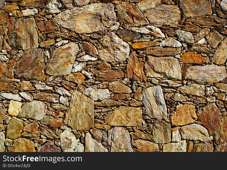 Detail from a stone wall - background