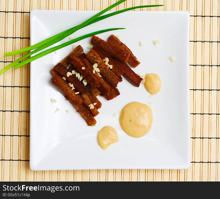 Rusk with spring onion.