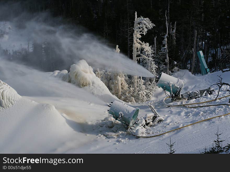 Nicely lit old-style snow makers looking oddly elegant.