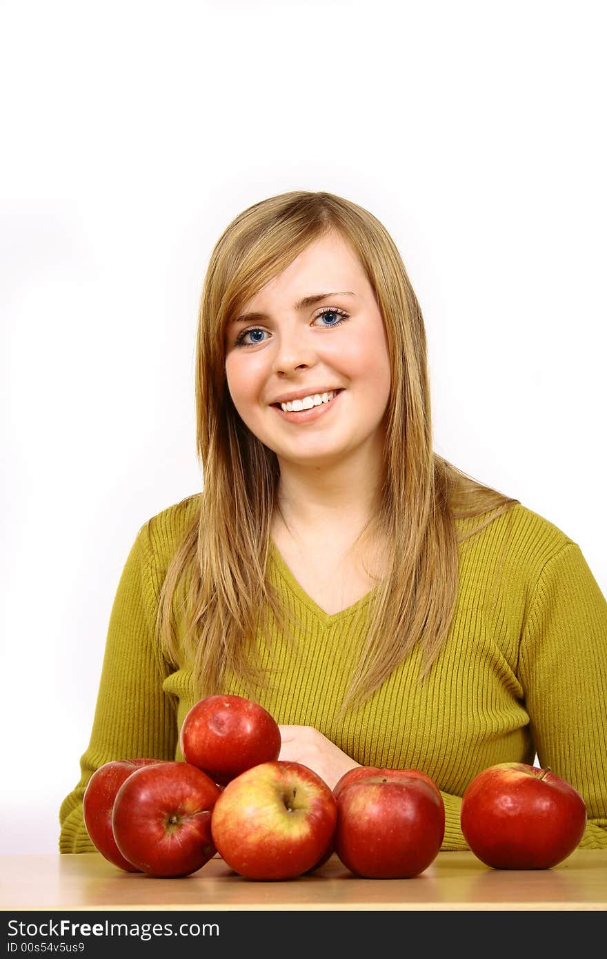 Beautiful young woman holding a apple