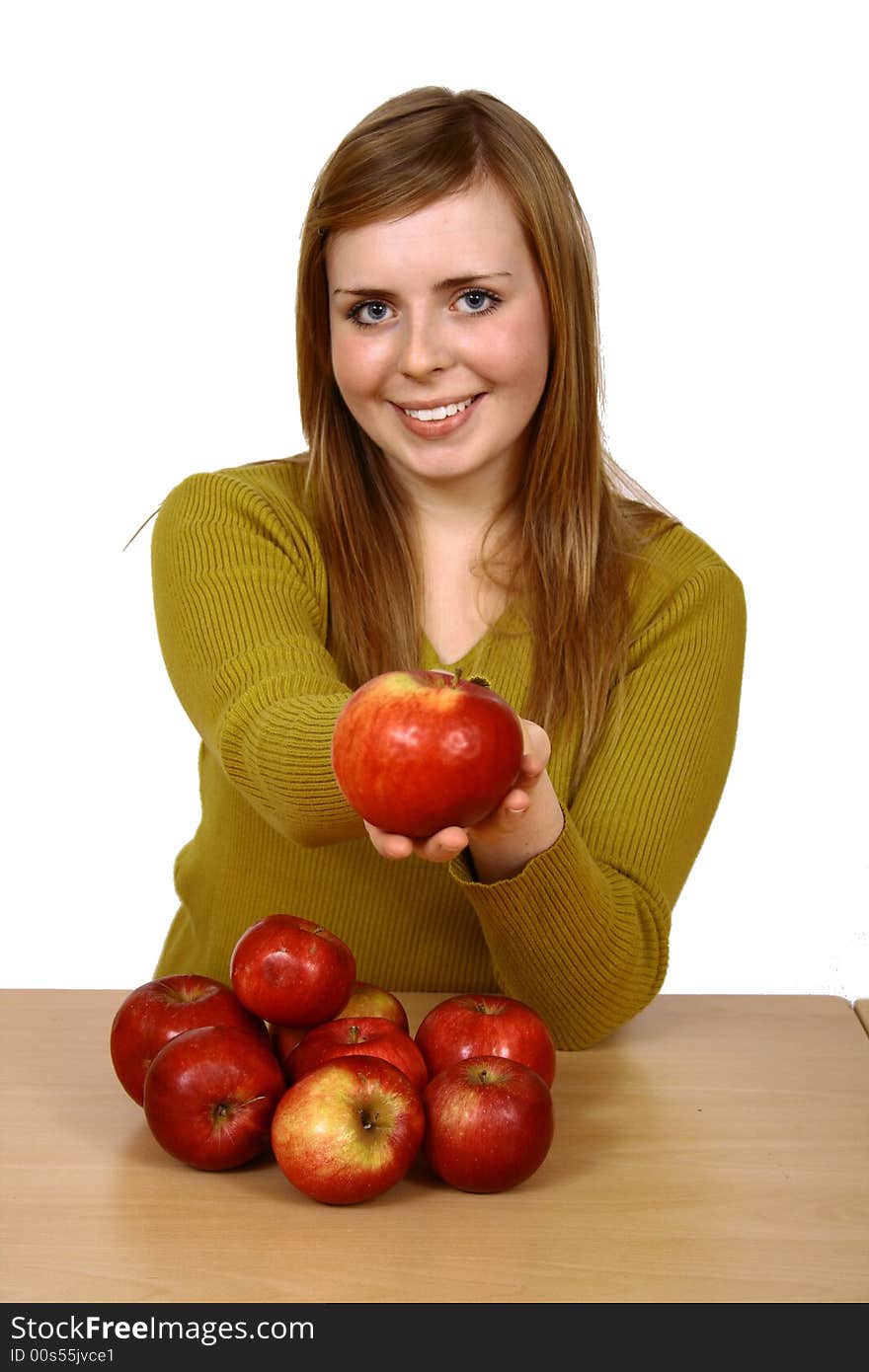 Beautiful young woman holding a apple