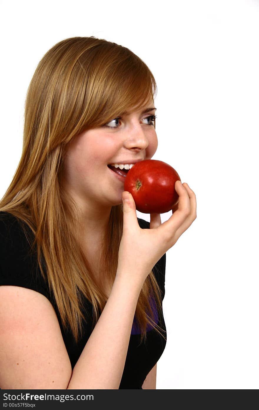 Beautiful young woman holding a apple