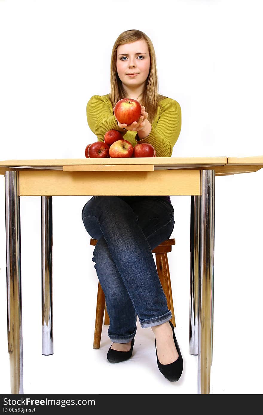 Beautiful young woman holding a apple