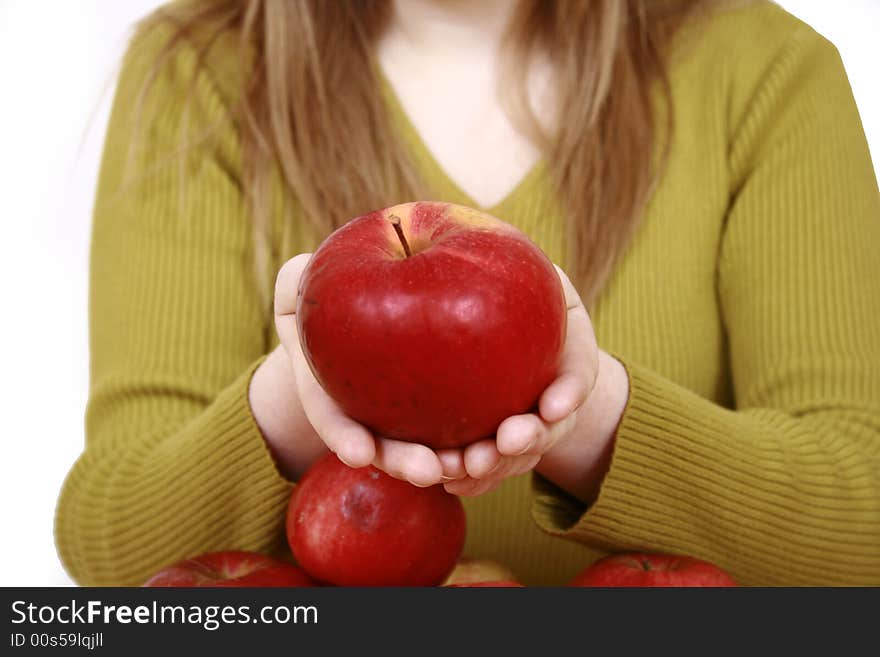 Beautiful young woman holding a apple