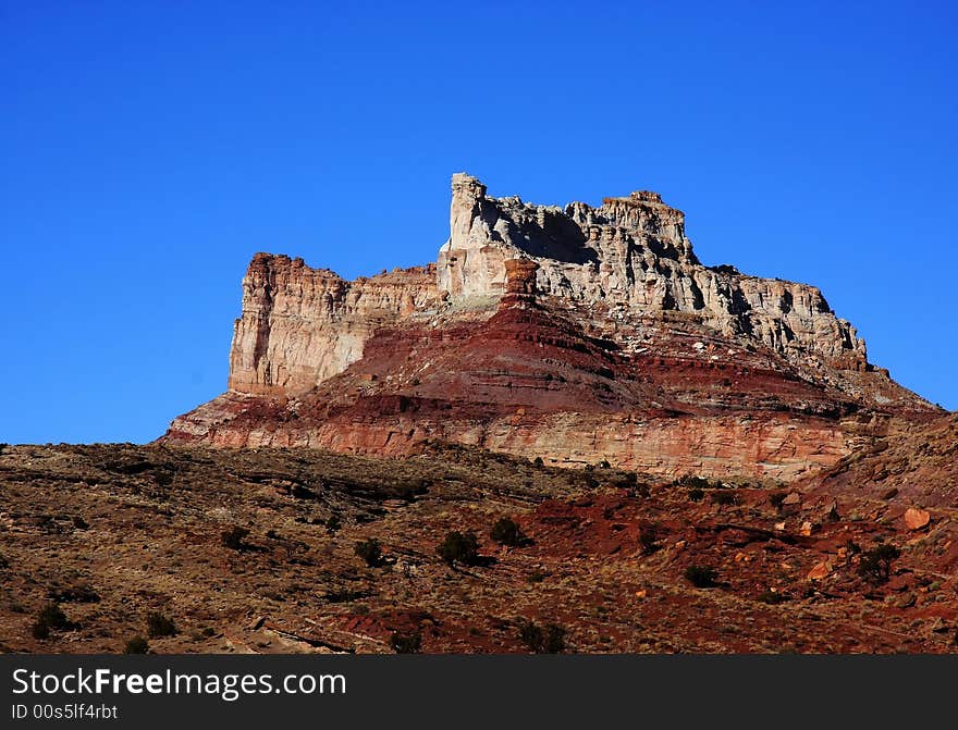 View of the red rock formations in Capitol Reef National Park with blue sky�s and clouds. View of the red rock formations in Capitol Reef National Park with blue sky�s and clouds