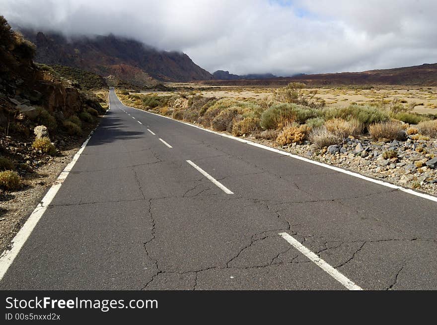 Cracked road in the crater of the Teide Volcano, Tenerife, Canary Islands. Cracked road in the crater of the Teide Volcano, Tenerife, Canary Islands