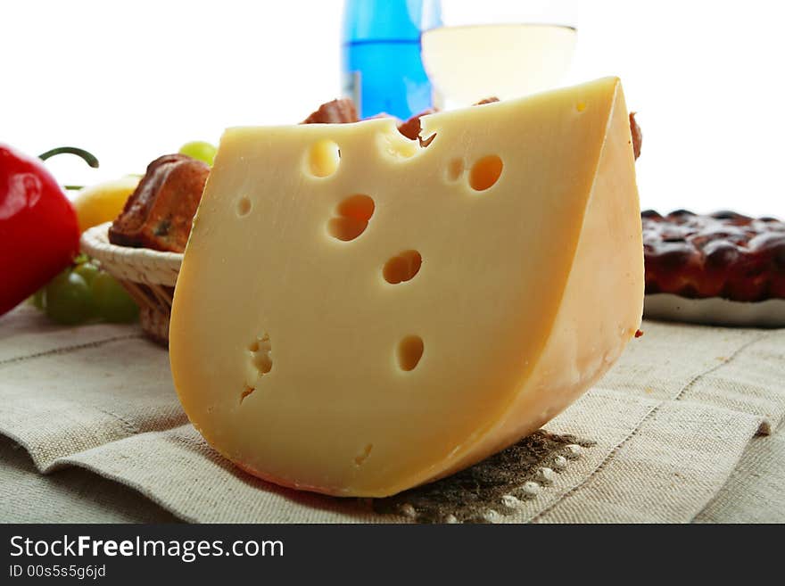 Natural form foods. Dairy produce, pastry, wine. Shot in a studio. Natural form foods. Dairy produce, pastry, wine. Shot in a studio.