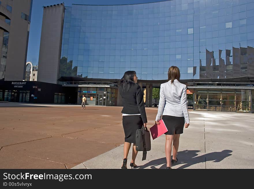 Two young Businesswomen going downtown. Two young Businesswomen going downtown