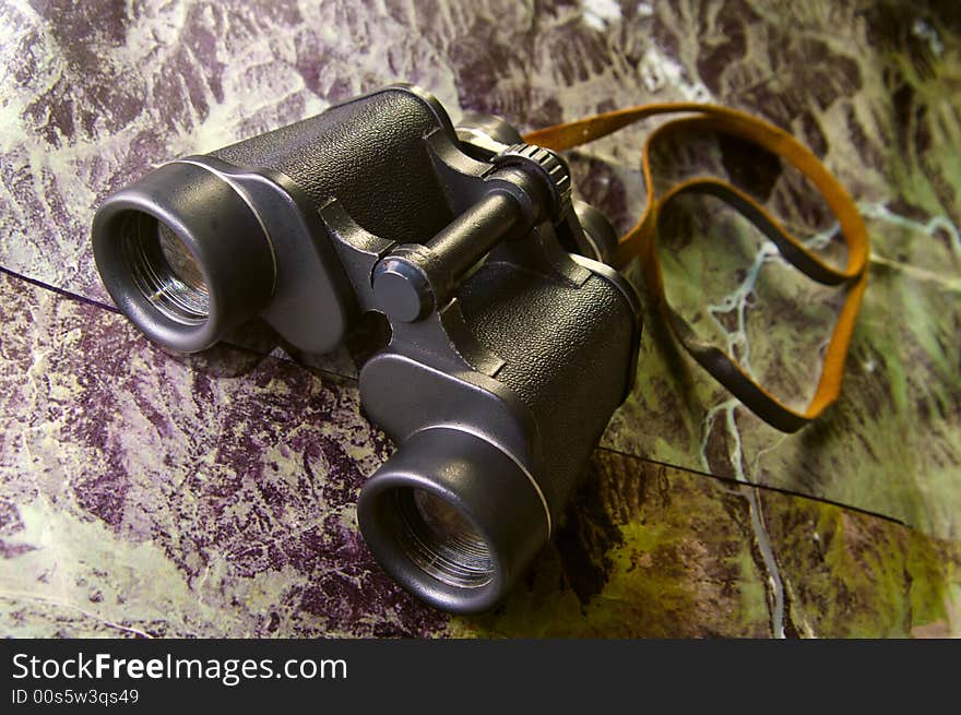 Binoculars on map