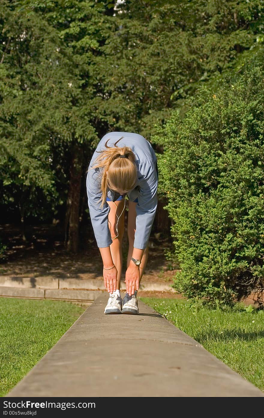 Woman making fitness in a park