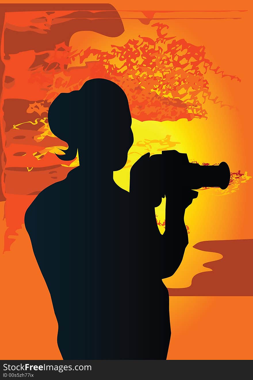 Female photographer holding a camera