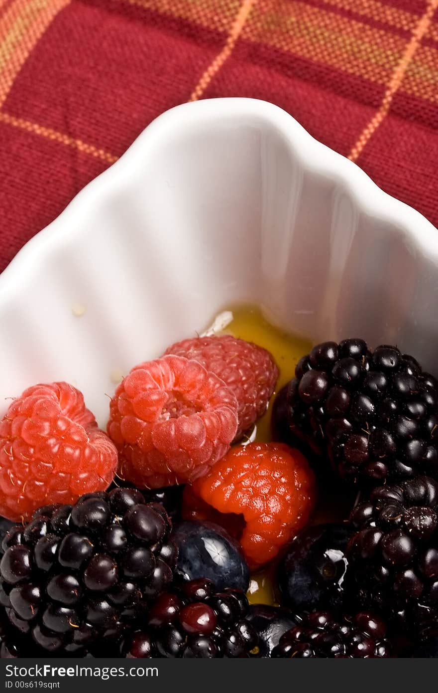 Healthy white bowl of ripe fruit in syrup. Healthy white bowl of ripe fruit in syrup