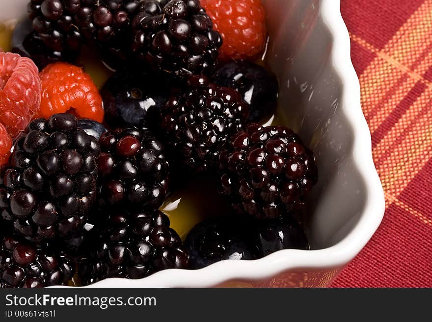 Healthy white bowl of ripe fruit in syrup. Healthy white bowl of ripe fruit in syrup