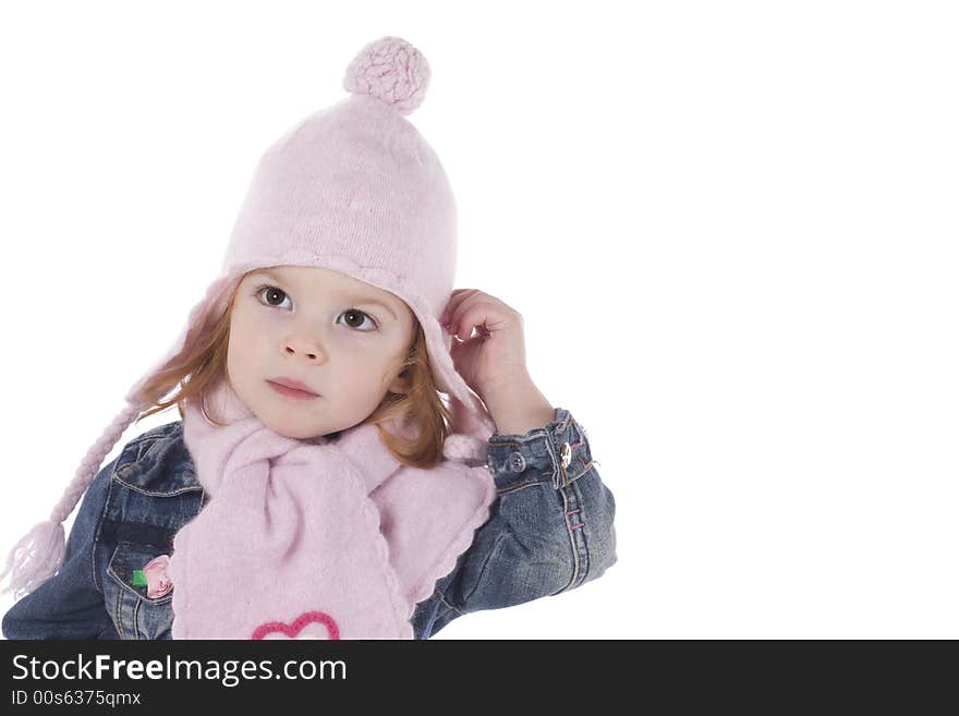 Cute little girl in winter outfit, studio shot, isolated