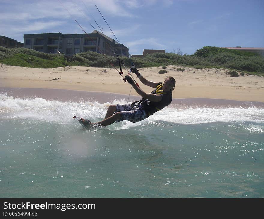 Kite surfer on colision course with the camera man. Kite surfer on colision course with the camera man