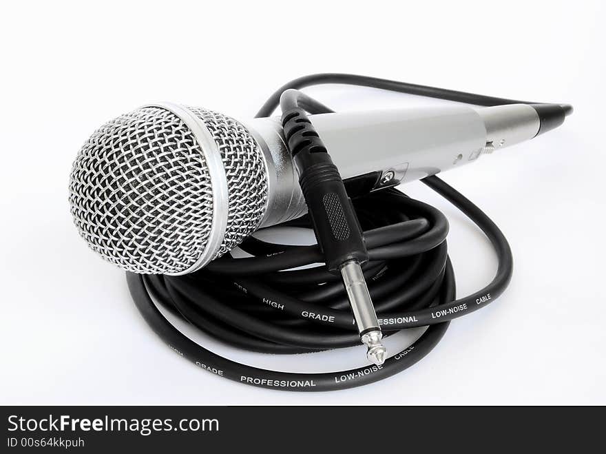 Microphone and cable on on a white background.