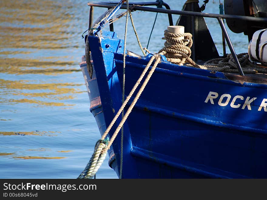 Fishibg boat and blue sea. Fishibg boat and blue sea