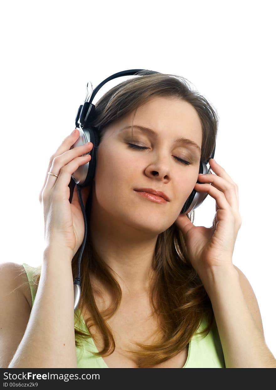 Pretty girl with headphones on white background