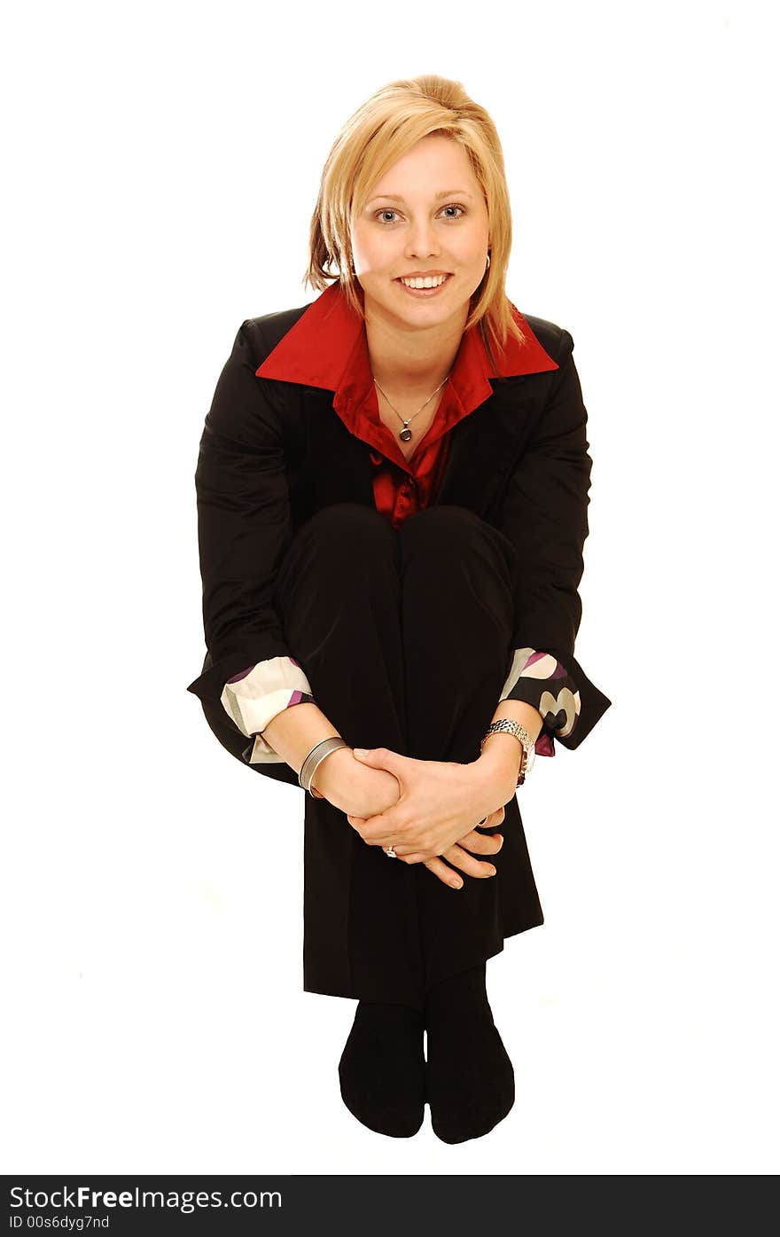 An friendly blond girl in an red blouse and black jacket sitting in an studio
for white background. An friendly blond girl in an red blouse and black jacket sitting in an studio
for white background.