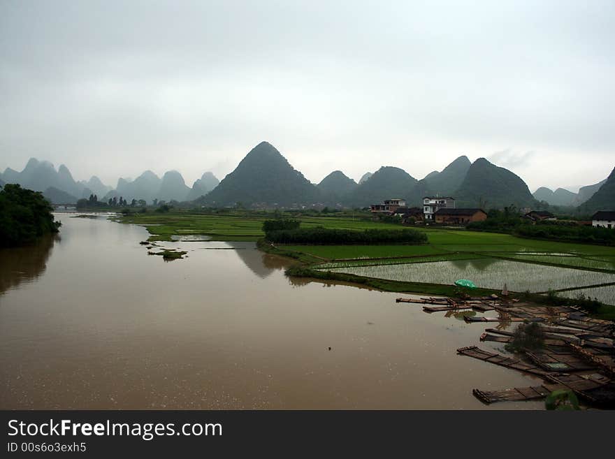 River through paddy and hills