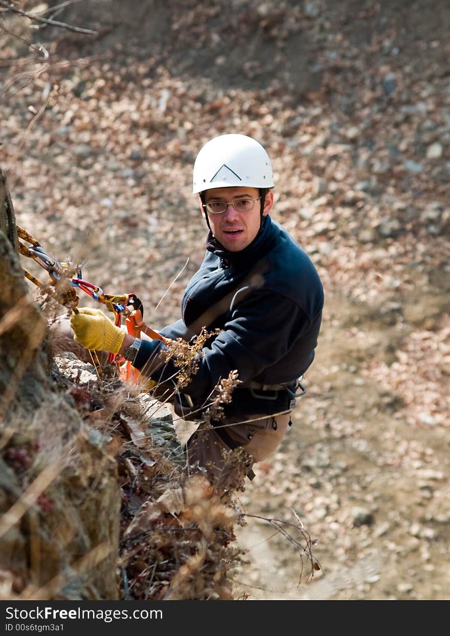 Climber On The Wall With Tired Face