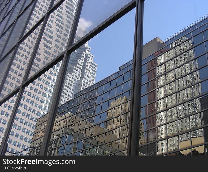 Building reflected in buildings, reflected in buildings - triple reflections in downtown Toronto.