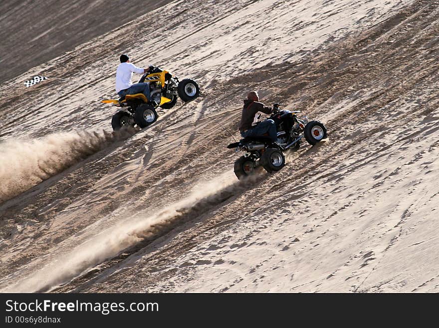 Two men drove up on a steep sand slop at little Sahara near Delta Utah. Two men drove up on a steep sand slop at little Sahara near Delta Utah