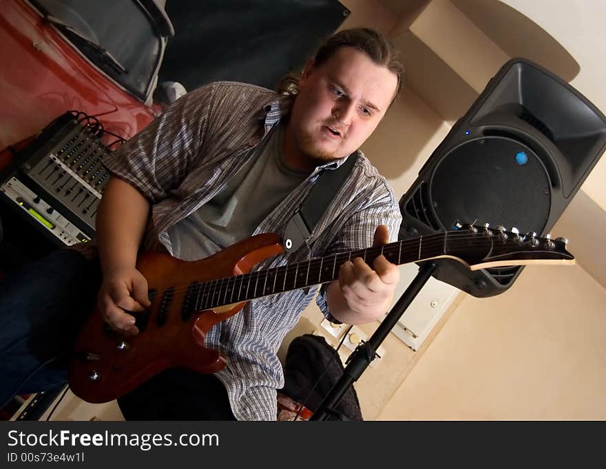 The musician with a guitar.  Concert of group StockDog in club the Woman-ljuba. Rostov-on-Don. Russia