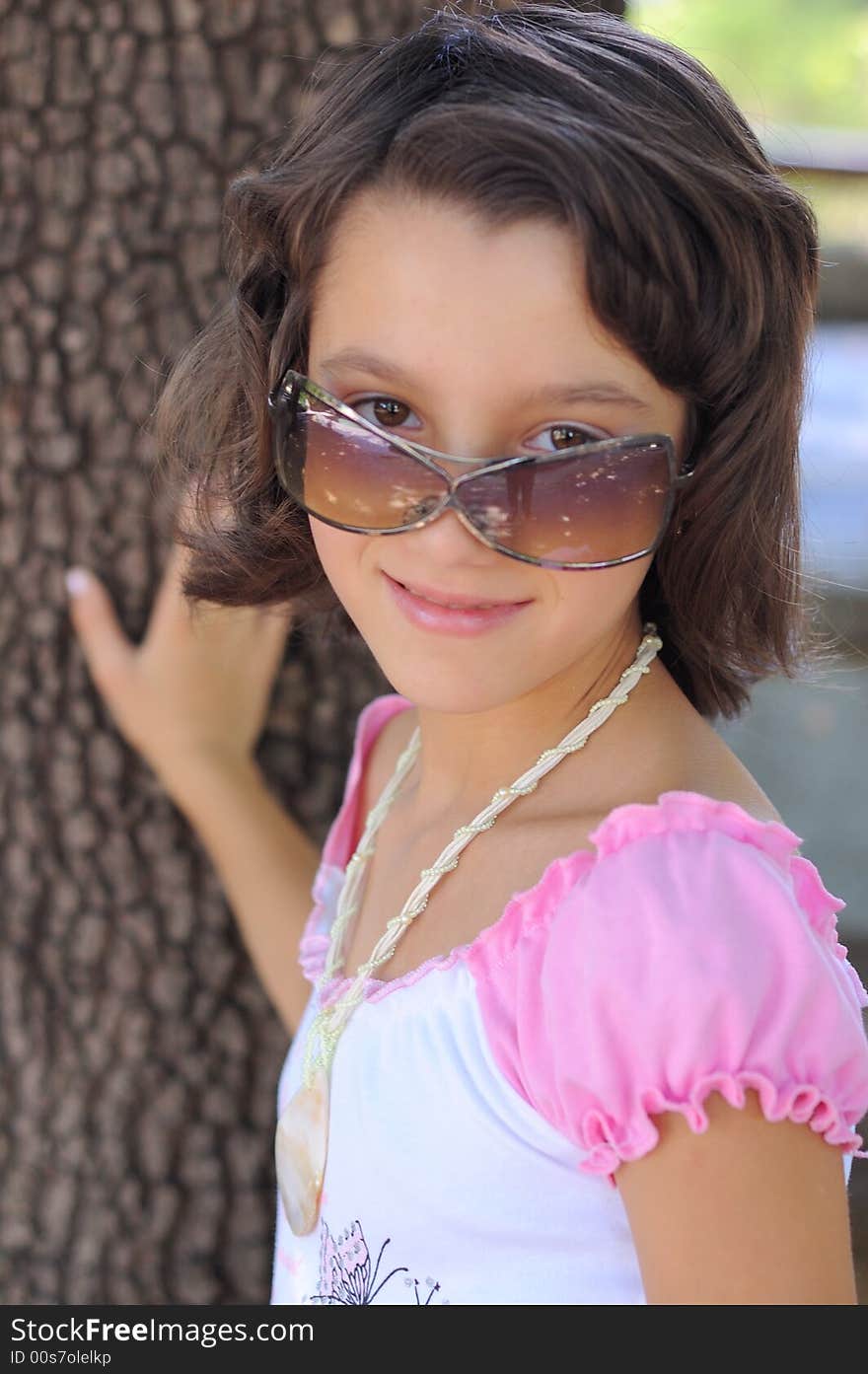 Young Girl With Sunglasses