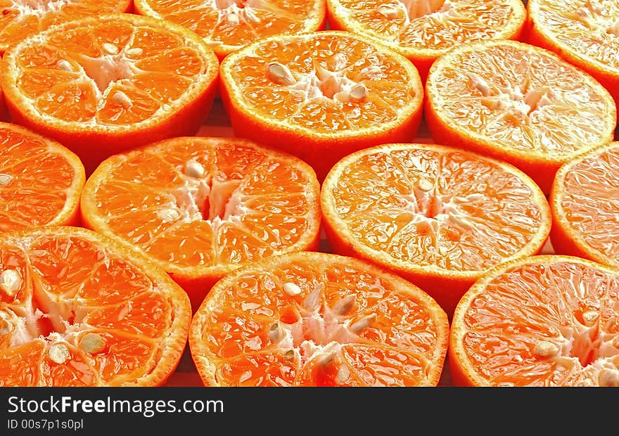 Ripe orange mandarine cutted in half