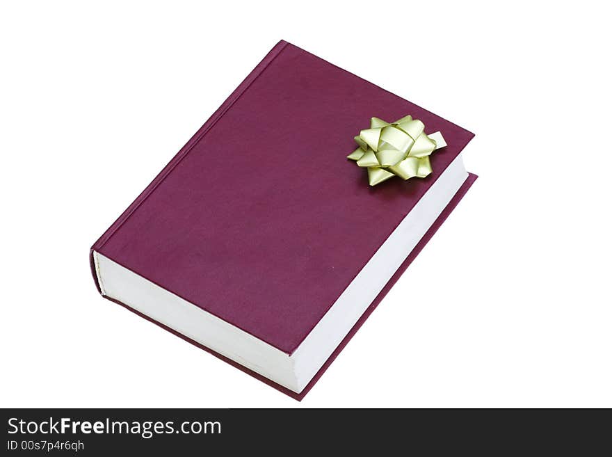 The red book in gift packing isolated on a white background. The red book in gift packing isolated on a white background