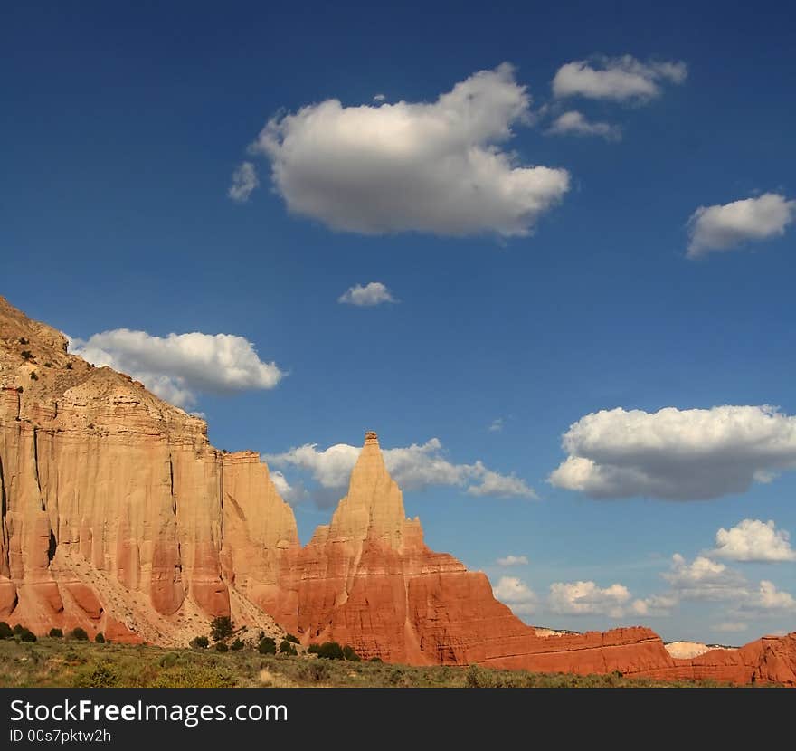 View of the red rock formations in Kodachrome Basin with blue skys and clouds. View of the red rock formations in Kodachrome Basin with blue skys and clouds