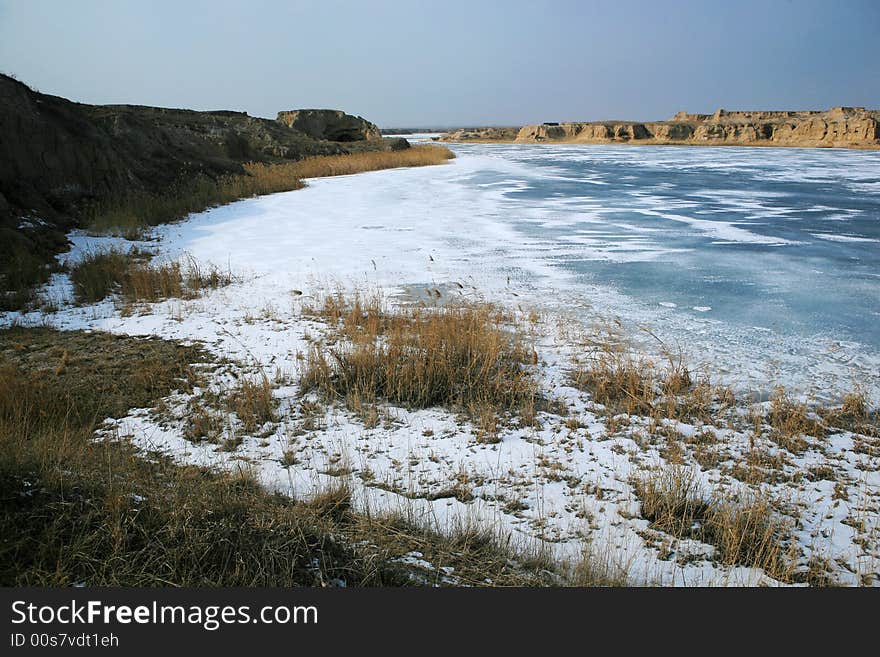 The picture was taken at Datong city, Shanxi Province China.Because of soil erosion, this part of the Loess Plateau become earth forest and there is a river in it. The river has been frozen. The picture was taken at Datong city, Shanxi Province China.Because of soil erosion, this part of the Loess Plateau become earth forest and there is a river in it. The river has been frozen.