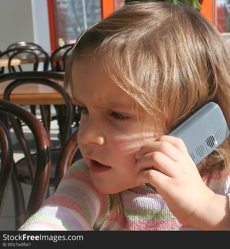 Kid having a telephone call