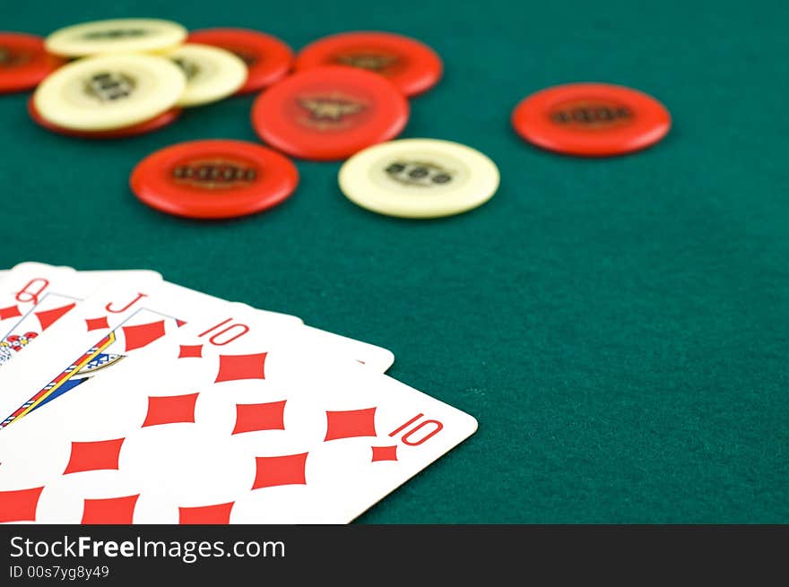 Cards with chips in the background with selective focus. Cards with chips in the background with selective focus