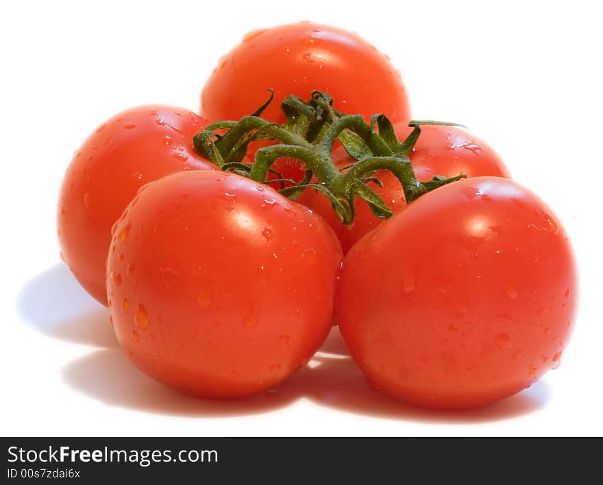 Red tomatoes isolated on a white background