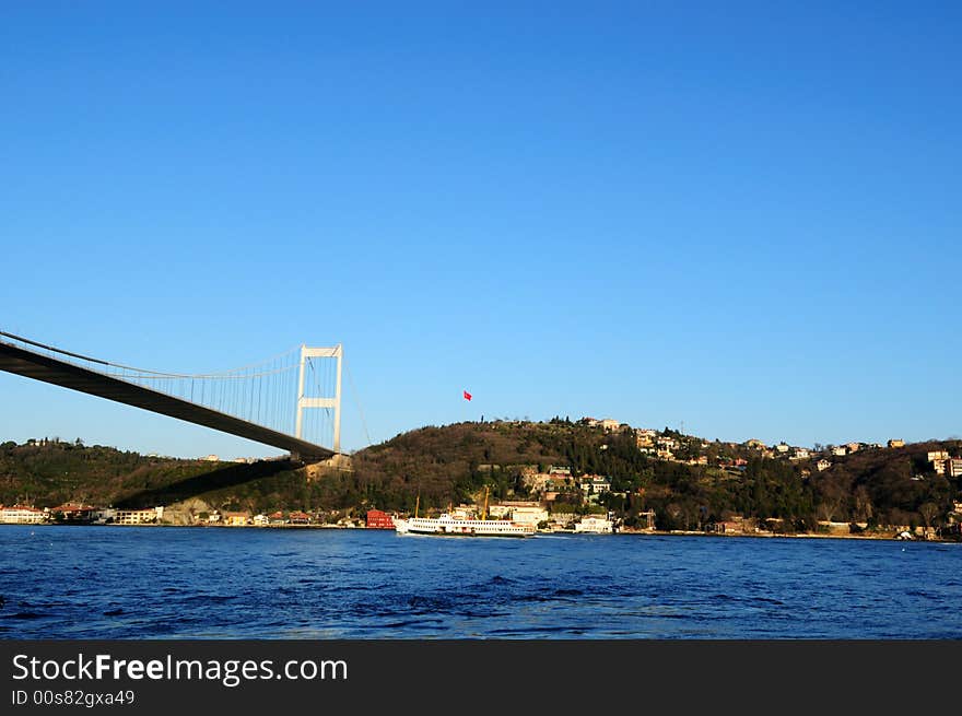 Istanbul Turkey. Ferry passing by Bosphorus bridge. Istanbul Turkey. Ferry passing by Bosphorus bridge