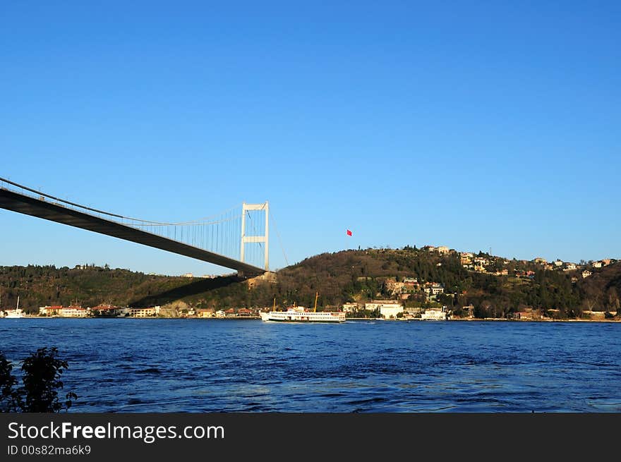 Istanbul Turkey. Ferry passing by Bosphorus bridge. Istanbul Turkey. Ferry passing by Bosphorus bridge