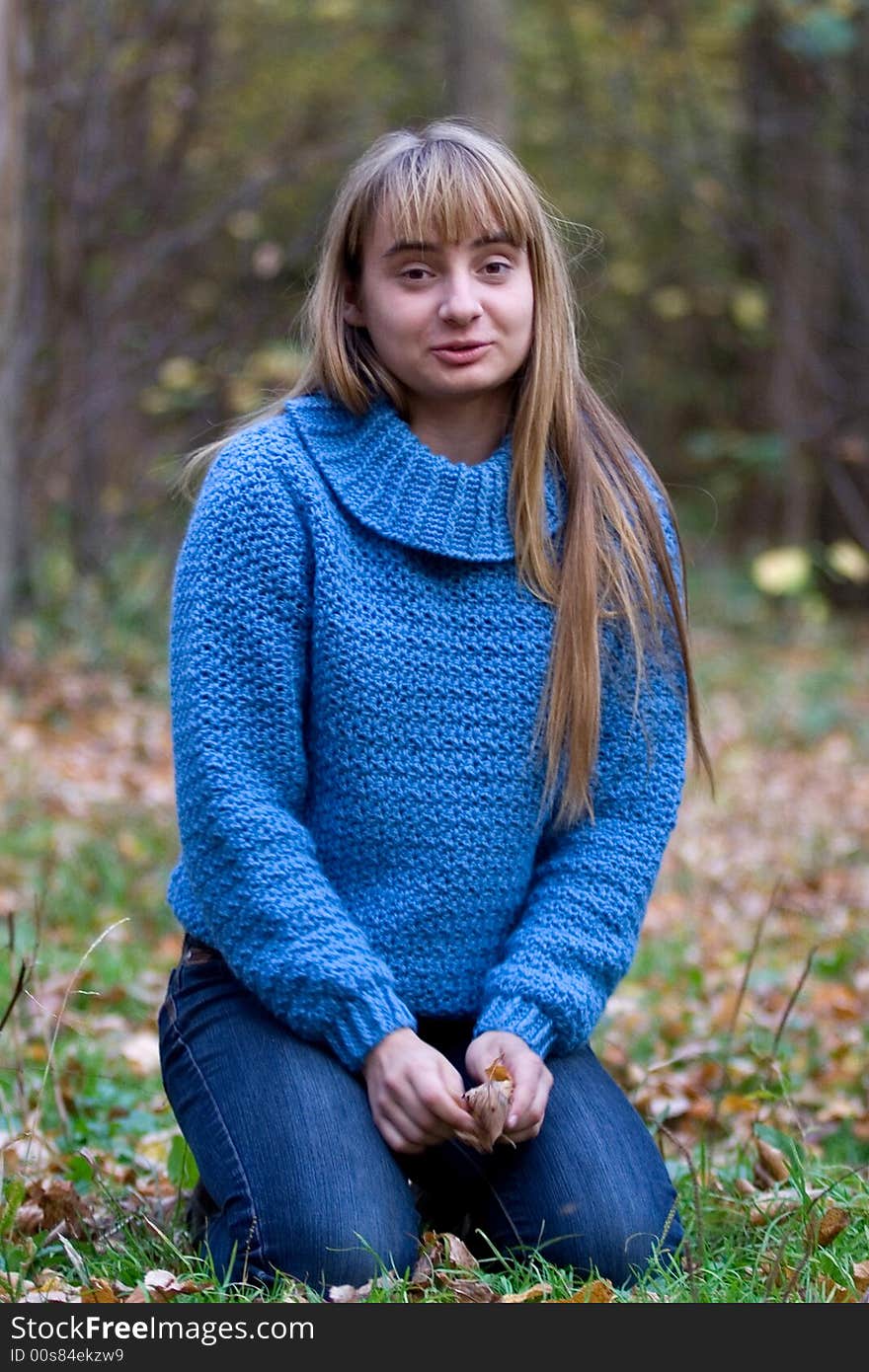 Portrait of the girl in autumn forest. Portrait of the girl in autumn forest