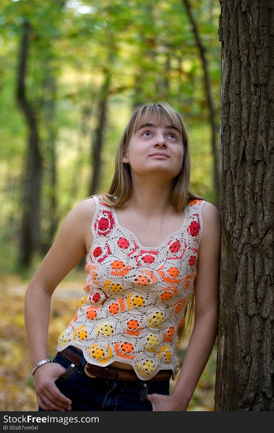 Portrait of the beautiful girl in autumn forest. Portrait of the beautiful girl in autumn forest.