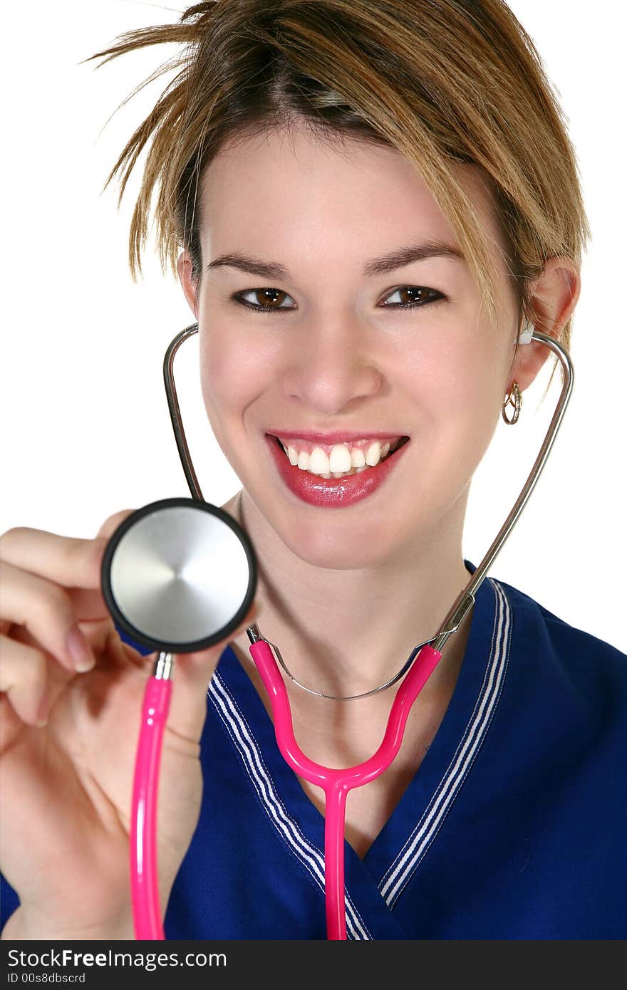 Beautiful young hispanic nurse in blue scrubs with pink stethoscope. Beautiful young hispanic nurse in blue scrubs with pink stethoscope.