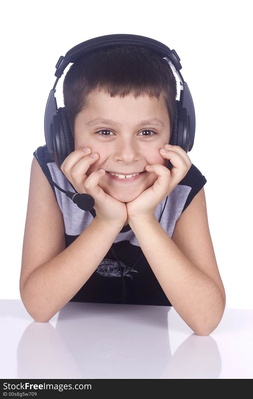 Young boy and headset isolated on white