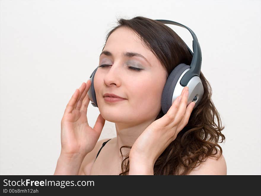 Young Woman Listening Music