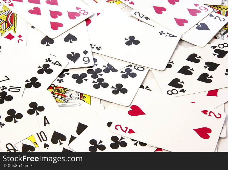 Scattered deck of playing cards for use as design background. Scattered deck of playing cards for use as design background