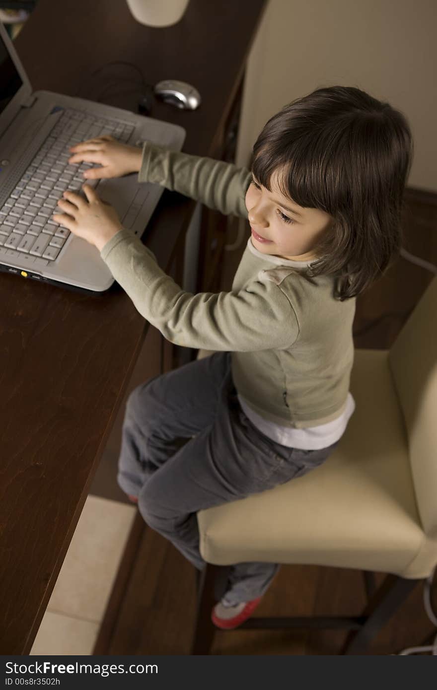 Young child working in computer. Young child working in computer