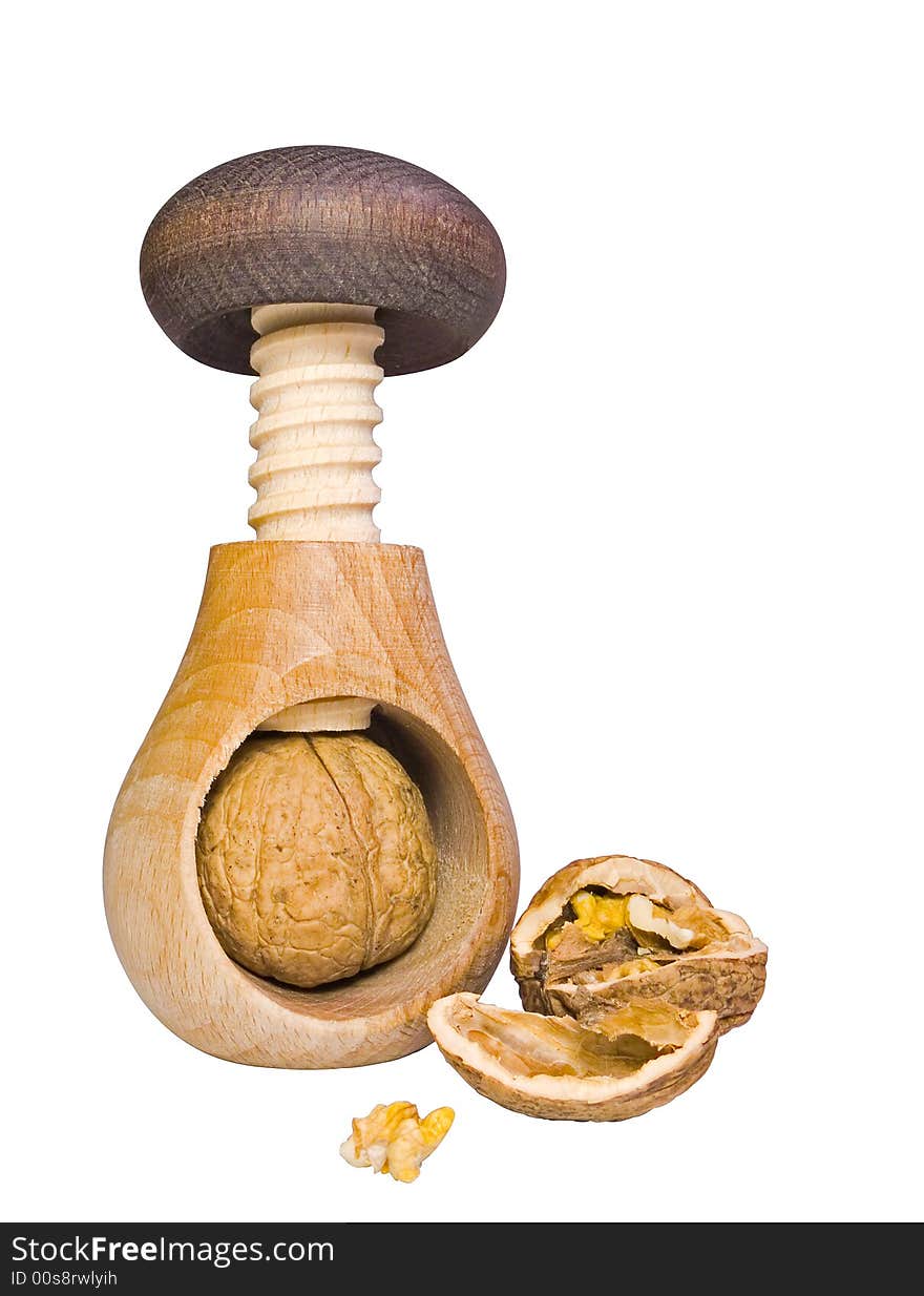 Nutcracker and cracked walnut isolated on white background. Working path included.