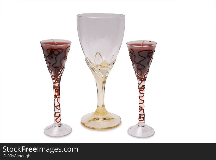 Wine glasss and two candles in wine glass. Wine glasss and two candles in wine glass