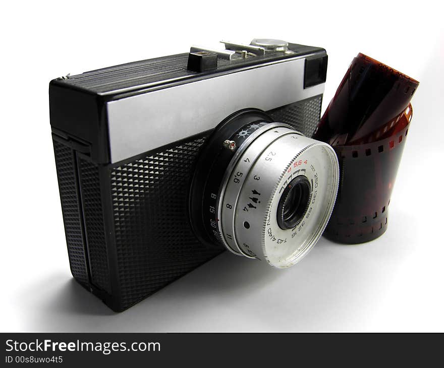 Old Simple Camera Isolated With Film