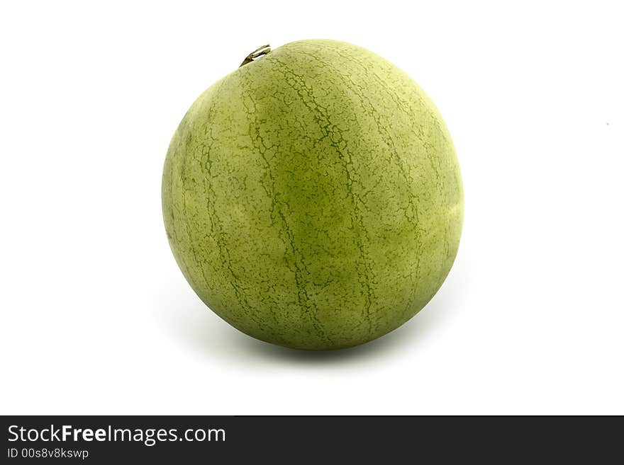 Green, fresh, striped whole melon on white