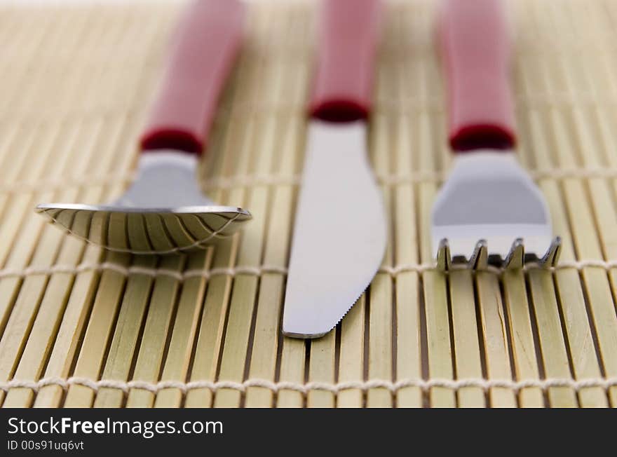 Spoon, Knife and Fork on Placemat